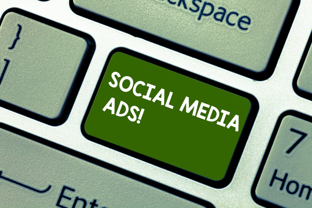 Social media apps open on a phone for mobile marketing