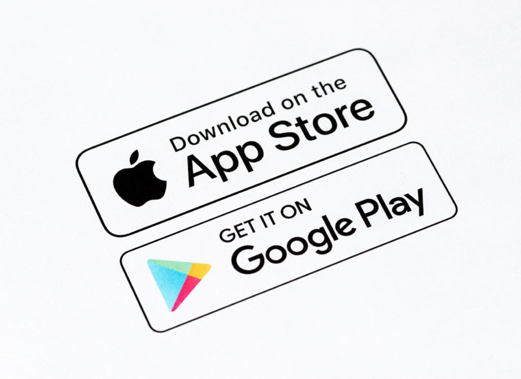 Developer using keyword research tools to optimize an app store listing