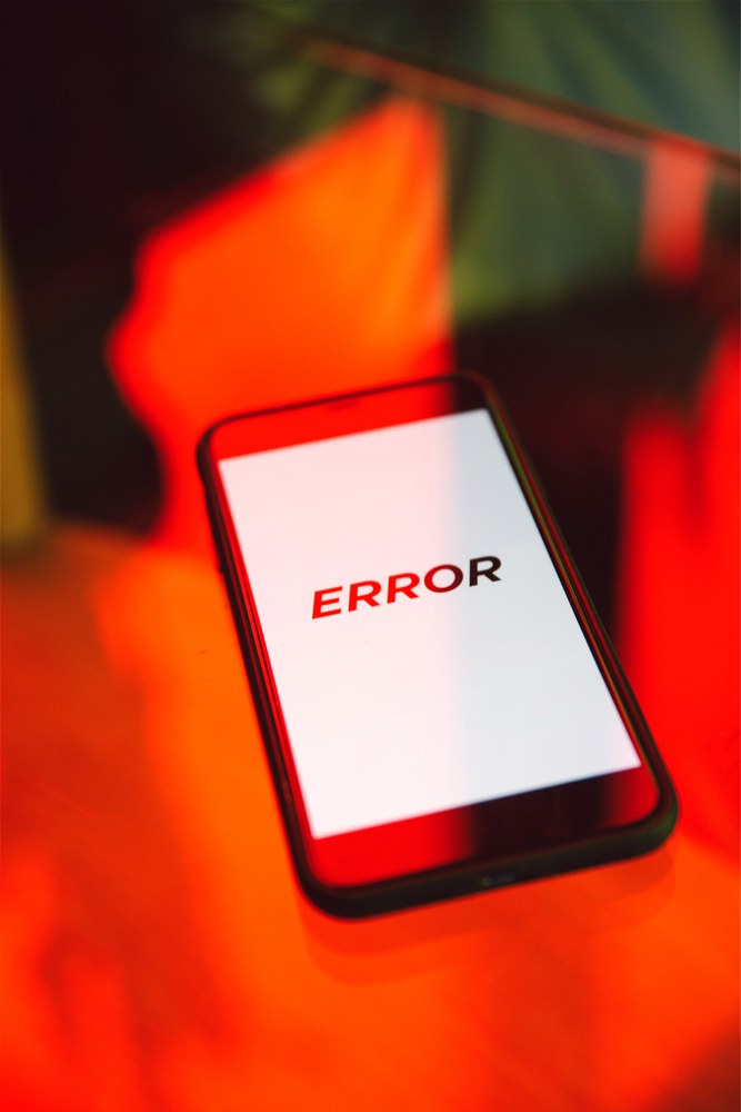 Frustrated user facing app crashes and errors on a phone