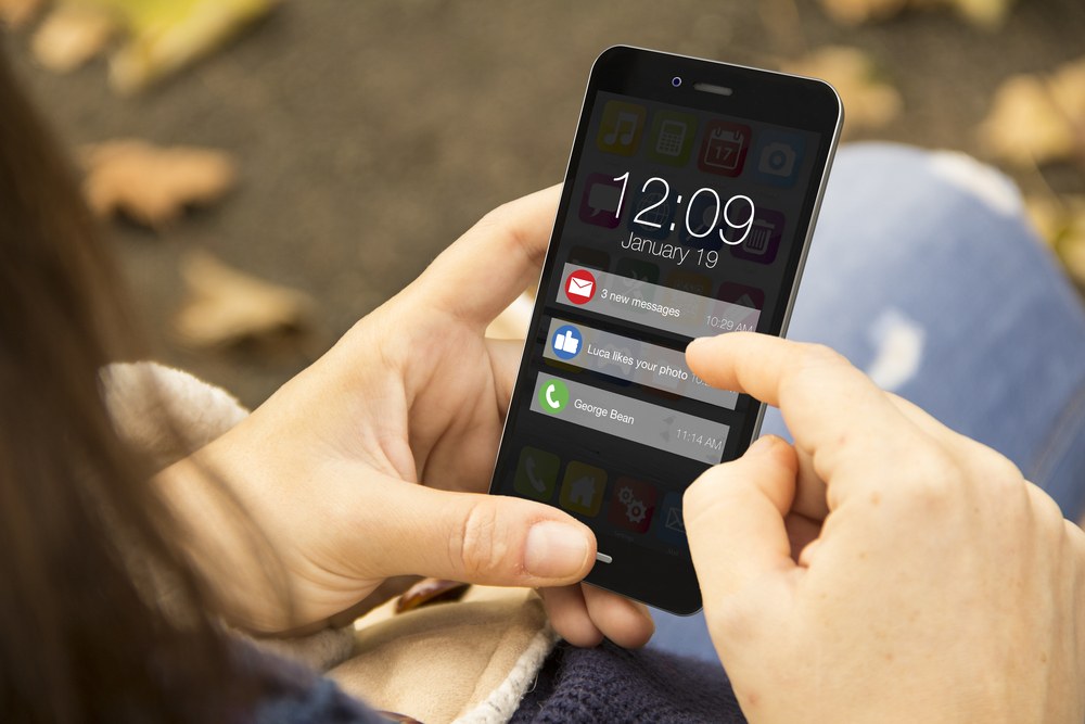 Smartphone showing annoying push notifications that drive app uninstalls
