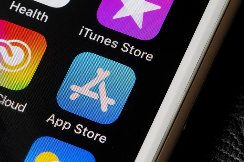 Person browsing apps on a smartphone
