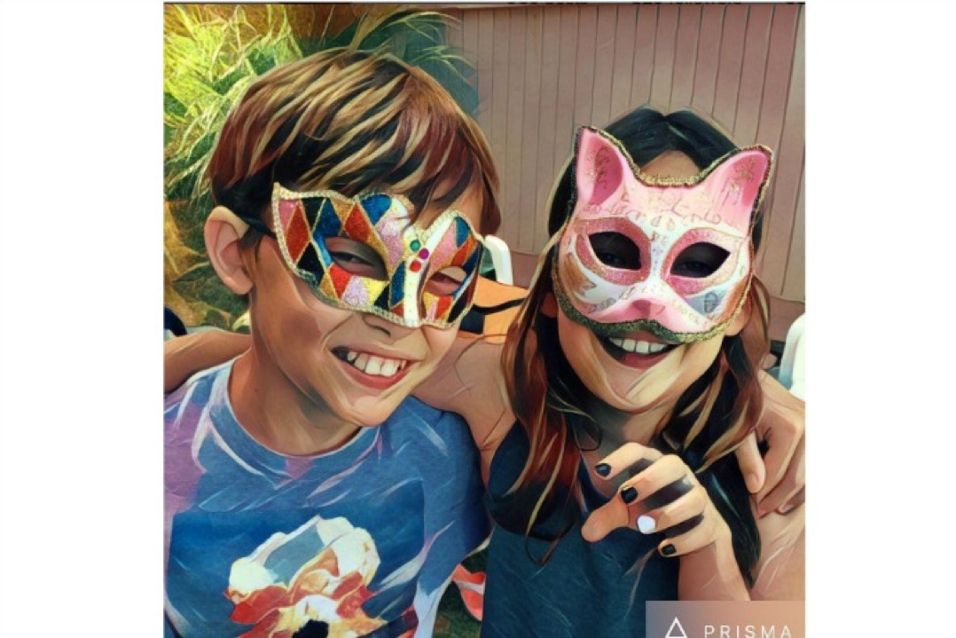 Person using the Prisma photo editing app on a smartphone