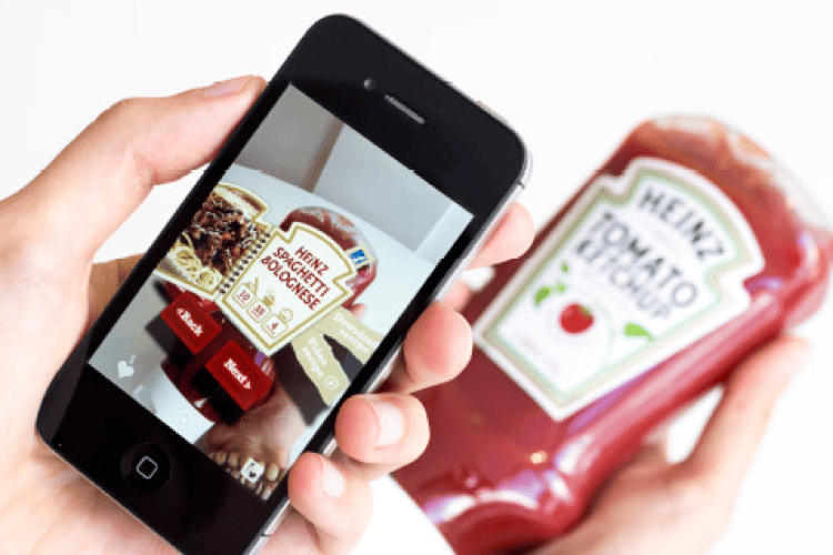 Heinz ketchup bottle AR app showing recipe suggestions on phone