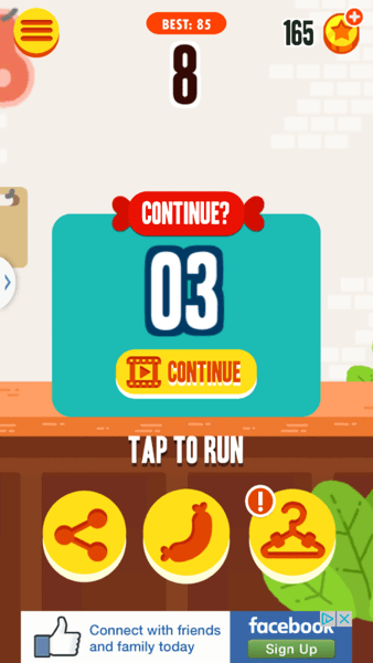 Rewarded video ad prompt in Run Sausage Run gameplay