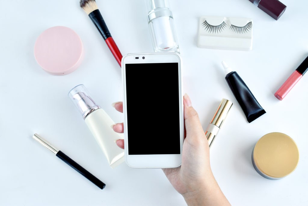 Beauty products and skincare items arranged on a flat surface
