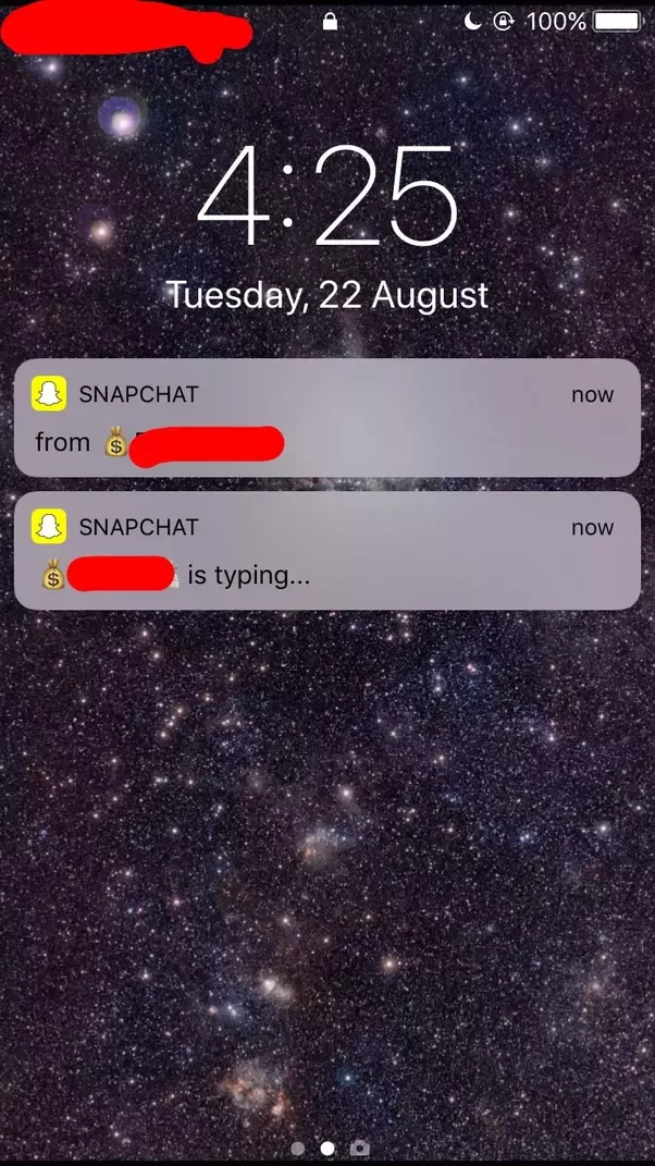 Snapchat push notification showing friend is typing on lock screen