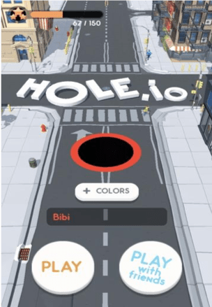 Hole.io gameplay showing black hole competing against other holes