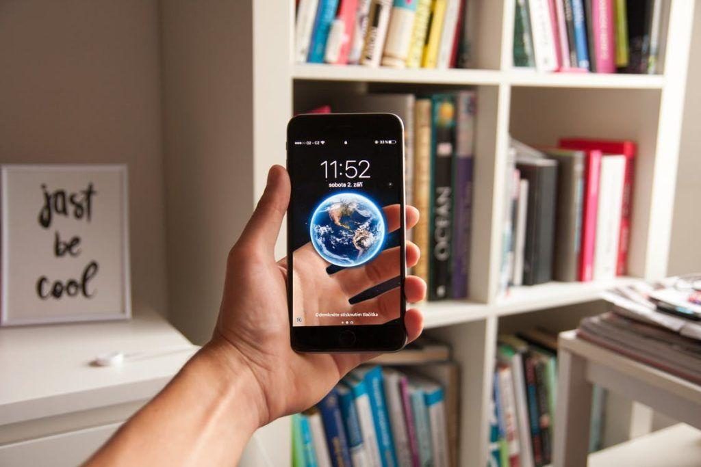 Person using a smartphone for mobile advertising