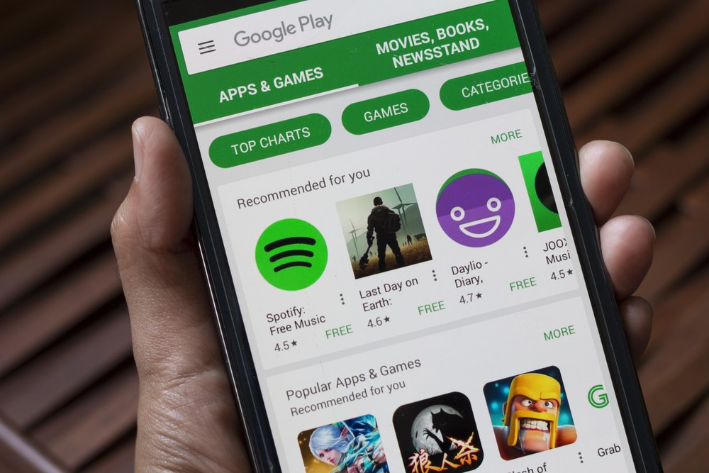 Person browsing mobile apps on a smartphone
