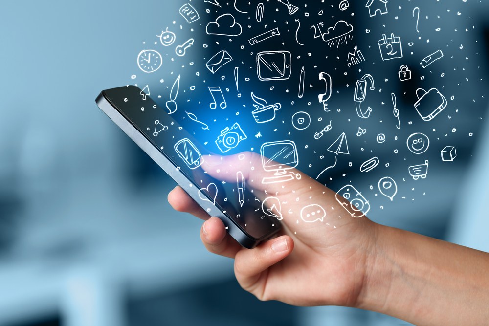 Marketer optimizing an app store listing on a laptop