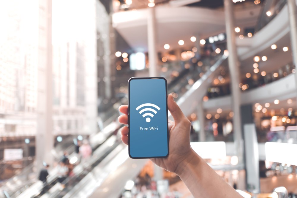Customer connecting to free in-store WiFi for proximity marketing notifications