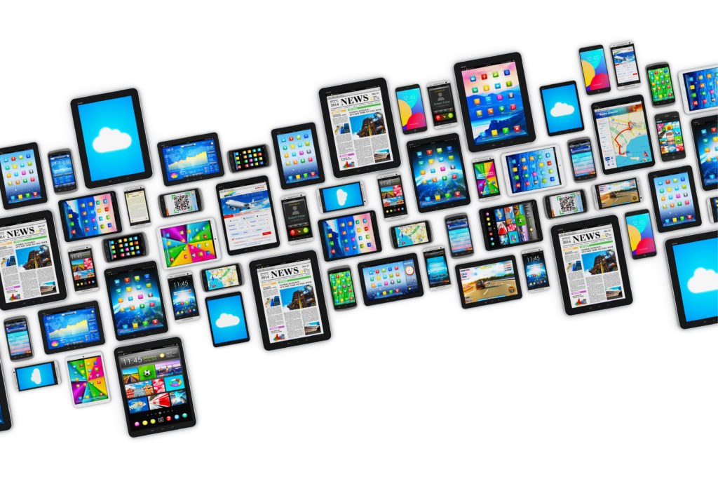 Developer testing a mobile app on a smartphone for compatibility