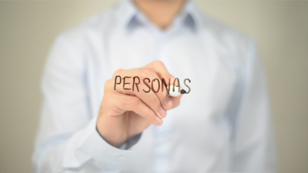 Marketer reviewing audience data to build buyer personas