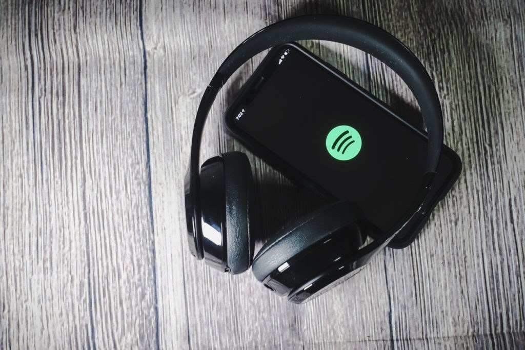 An iphone 11 screen showing spotify icon