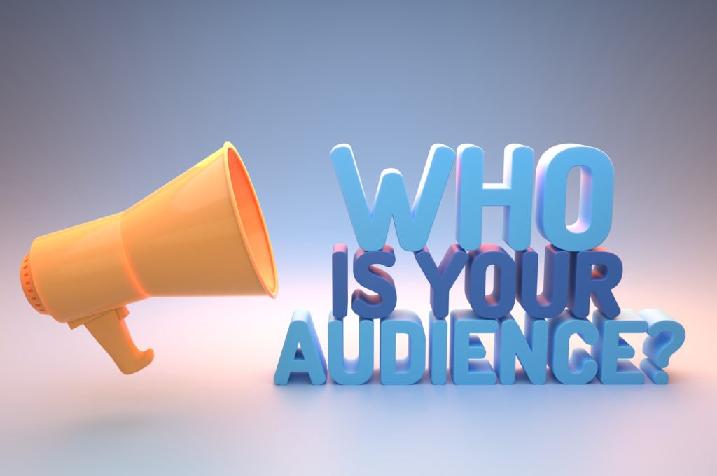 Marketers analyzing audience segments and targeting data