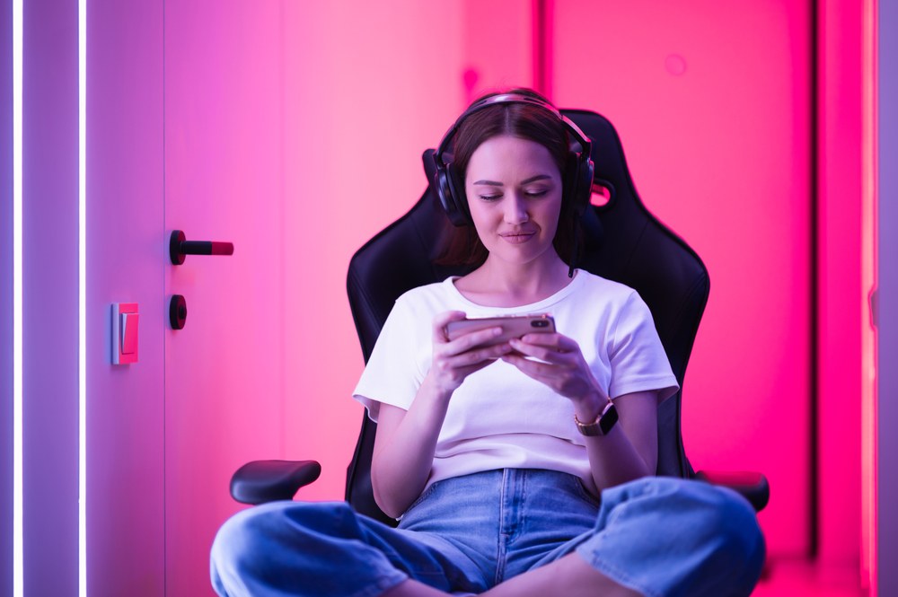 Gaming influencer streaming live gameplay to engaged followers